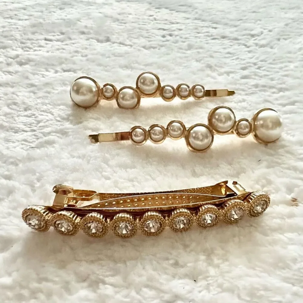 Gold rhinestone and faux pearl hair clip set ￼
